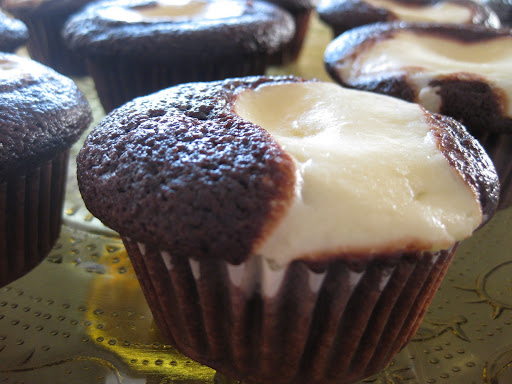 Black Bottom Cupcakes Recipe - Black cupcakes with white swirls