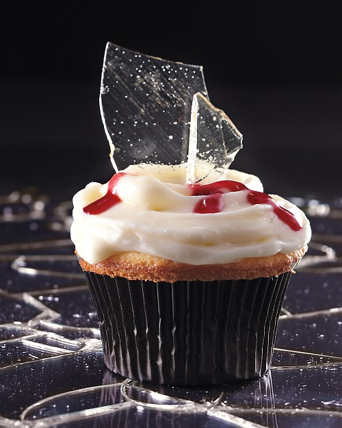 caramel glass, white frosting blood dripping holloween cupcake
